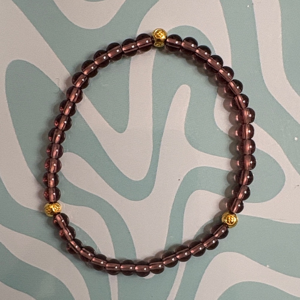 Elegant Purple Beaded Bracelet with Gold Accents